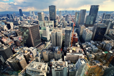 OSAKA - DECEMBER 12: Osaka cityscape with corporate logos visible December 12, 2012 in Osaka, JP. The city is third largest in the country with a population of over 2.6 million.のeditorial素材