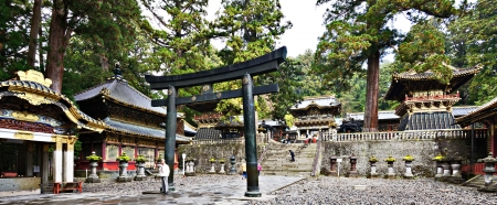 Nikko, Japan - November 11, 2012: Tourists at Toshogu shrine. The shrine holds the mausoleum of Tokugawa Ieyasu, founder of the Tokugawa shogunate, which ruled Japan for over 250 years until 1868.のeditorial素材