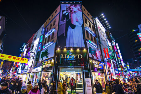 SEOUL - FEBRUARY 14: Myeong-Dong Neon Lights February 14, 2013 in Seoul, South Korea. The location is the premiere district for shopping in the city.のeditorial素材