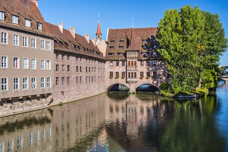 Nuremberg, Germany at the historic Hospital of the Holy Spirit on the Pegnitz River.のeditorial素材
