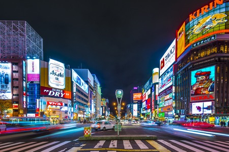 SAPPORO, JAPAN - OCTOBER 17, 2012: Traffic passes through the Susukino District. Susukino is one of the three major red-light districts within Japan.のeditorial素材