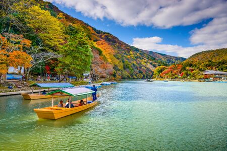 Arashiyama, Japan on the Katsura River during the autumn season.の写真素材