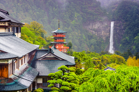 hillside temples with Seiganto-ji Pagoda and Nachi Waterfall in Nachi, Japanのeditorial素材