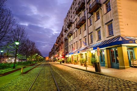 SAVANNAH, GEORGIA - JANUARY 10, 2015: Shops and restaurants line River Street. The historic street is the center of nightlife in the city.のeditorial素材