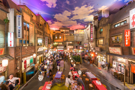 YOKOHAMA, JAPAN - AUGUST 11, 2015: Crowds in the Shinyokohama Raumen Museum. The exhibit is a 1:1 replica of the historic Shitamachi district of Tokyo and offers regional Ramen restaurants.のeditorial素材