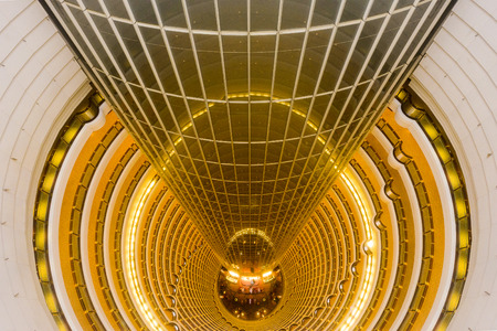 SHANGHAI, CHINA - JUNE 18, 2014: The Grand Hyatt Shanghai viewed from atop the atrium. The 33-story atrium is one of the highest in the world.のeditorial素材