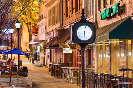 ATHENS, GEORGIA - MARCH 14, 2016: The downtown Main Square and clock in Athens. The University of Georgia is located in this college own.のeditorial素材