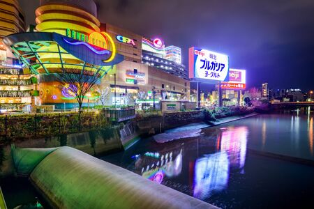 FUKUOKA, JAPAN - DECEMBER 6, 2012: Canal City shops at night. Canal City is the largest private development in the history of Japan at a size of 2.5-million sq. ft.のeditorial素材