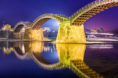 Iwakuni, Hiroshima, Japan at Kintaikyo Bridge at night.の写真素材