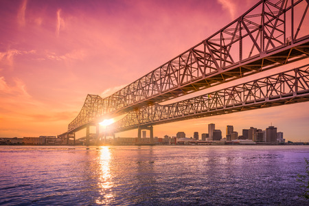 New Orleans, Louisiana, USA at Crescent City Connection Bridge over the Mississippi River during sunset.の写真素材