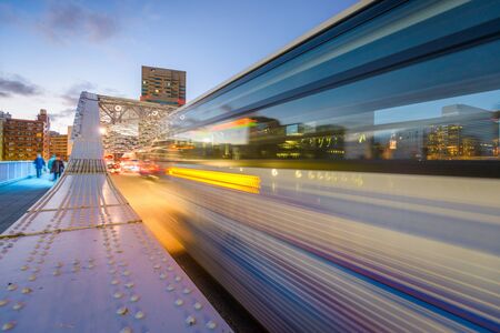 Eitai Bridge, Tokyo, Japan with evening rush hour traffic.
