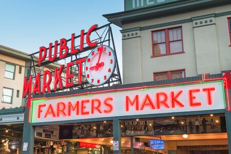 SEATTLE; WASHINGTON - July 2; 2018: Pike Place Market at night. The popular tourist destination opened in 1907 and is one of the oldest continuously operated public markets in the United states.のeditorial素材