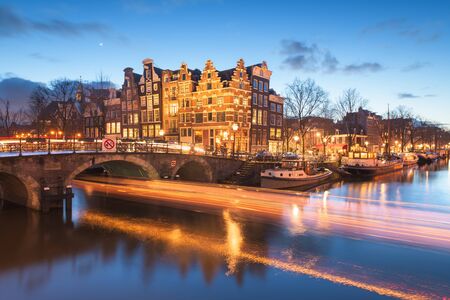 Amsterdam, Netherlands bridges and canals at twilight.の写真素材