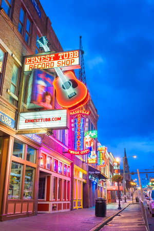 NASHVILLE, TENNESSEE - AUGUST 20, 2018: Honky-tonks on Lower Broadway. The district is famous for the numerous country music entertainment establishments.のeditorial素材