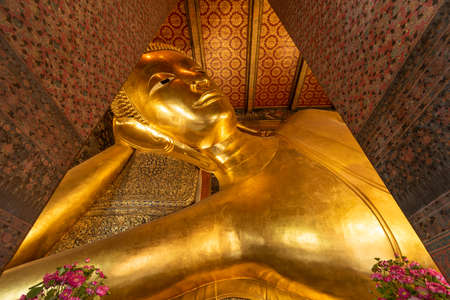 BANGKOK, THAILAND - SEPTEMBER 23, 2015: The Reclining Buddha of Wat Pho Temple in Bangkok. The temple was founded in the 16th century and is considered one of Bangkok's oldest temples.のeditorial素材