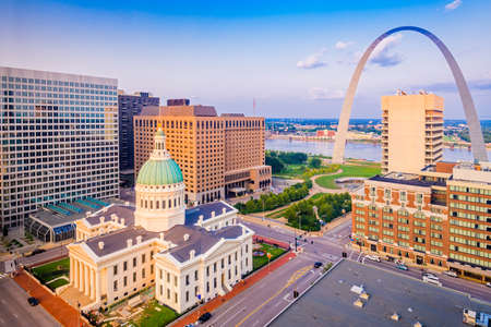 St. Louis, Missouri, USA downtown cityscape with the arch and courthouse at dusk.の写真素材
