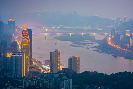Chongqing, China downtown city skyline over the Yangtze River at sunset.の写真素材