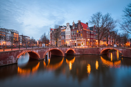 Amsterdam, Netherlands bridges and canals at twilight.の写真素材