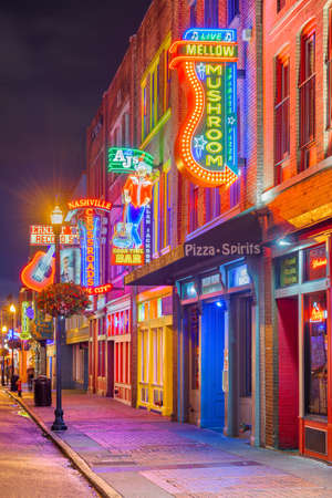 NASHVILLE, TENNESSEE - AUGUST 20, 2018: Honky-tonks on Lower Broadway. The district is famous for the numerous country music entertainment establishments.のeditorial素材