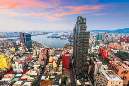 Kaohsiung, Taiwan city skyline towards the harbor at dusk.の写真素材