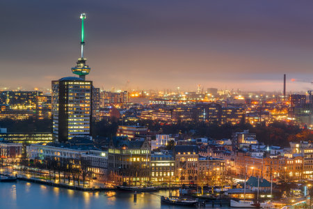 Rotterdam, Netherlands cityscape on the Nieuwe Maas River at night.の写真素材