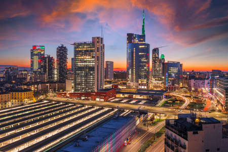 Milan, Italy with modern high rises in Porta Nuova at twilight.の写真素材