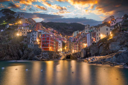 Riomaggiore, La Spezia, Italy beautiful hillside town in Cinque Terre at dawn.