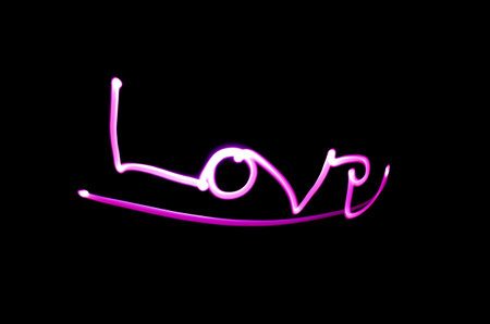 Love light painted against black.の写真素材