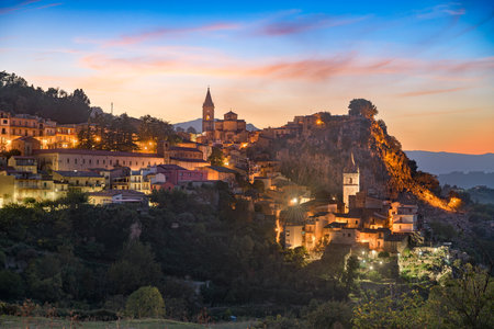Novara di Sicilia, Italy village skyline on the island of Sicily at dusk.の写真素材