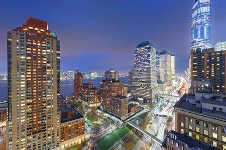 New York, New York, USA financial district cityscape over the West Side Highway at dusk.の写真素材