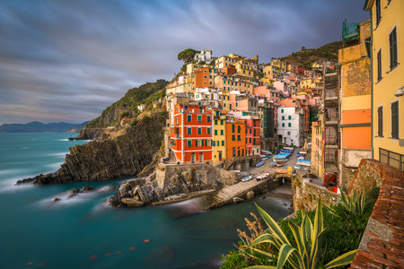 Riomaggiore, Italy, in the Cinque Terre coastal area at dusk.の写真素材
