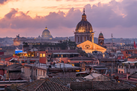 Rome, Italy rooftop skyline at dusk with the Vatican in the distance.の写真素材