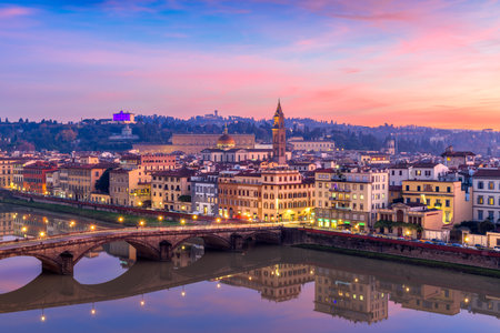 Florence, Italy overlooking the Arno River at twilight.の写真素材