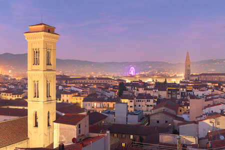 Florence, Italy historic cityscape with church bell towers at dusk.の写真素材