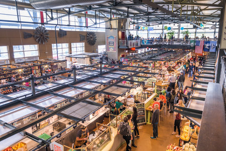 MILWAUKEE, WISCONSIN - MAY 19, 2018: Shoppers in the interior of Milwaukee Public Market. The market opened in 2005.のeditorial素材