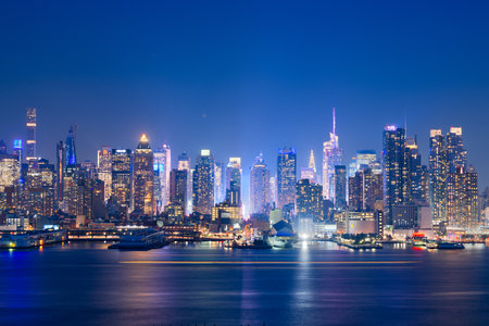 New York, New York, USA midtown skyline at dusk from the Hudson River.の写真素材