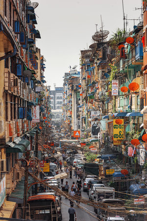 YANGON, MYANMAR - OCTOBER 18, 2015: Alleyway in Yangon in front of Bogyoke Market. Yangon is the country's largest city.のeditorial素材