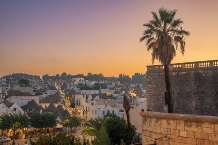 Alberobello, Italy with Trulli houses at dusk.の写真素材