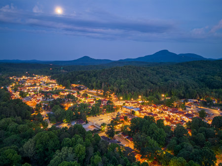 Helen, Georgia, USA downtown at night with Mt. Yonah in the distance.の写真素材