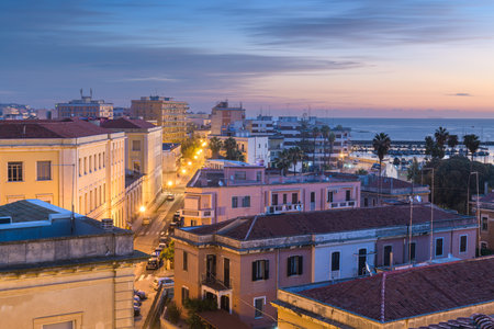 Syracuse, Sicily, Italy rooftop cityscape views on the coast at dawn.の写真素材