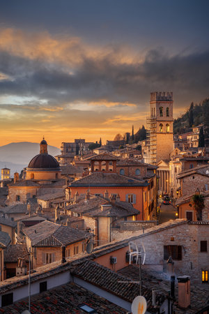 Assisi, Italy rooftop hilltop old town skyline at dusk.の写真素材