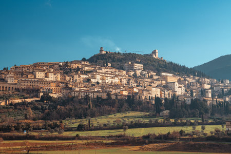 Assisi, Italy town skyline with the Basilica of Saint Francis of Assisi.の写真素材