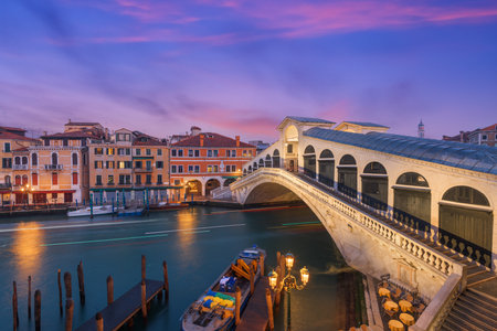 Venice, Italy at the Rialto Bridge over the Grand Canal at twilight.の写真素材