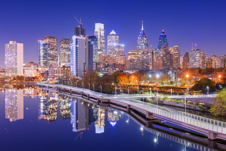 Philadelphia, Pennsylvania, USA downtown skyline on the river in autumn.の写真素材