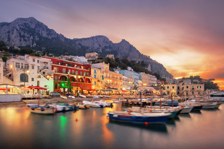 Capri, Italy with shops and restaurants at at Marina Grande at twilight.の写真素材