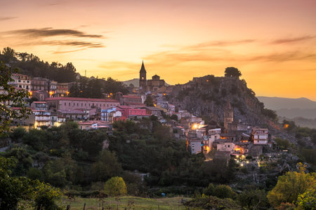 Novara di Sicilia, Italy village skyline on the island of Sicily at dusk.の写真素材