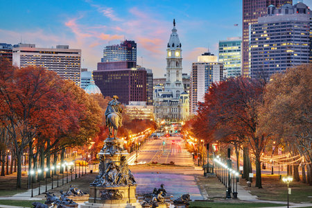 Philadelphia, Pennsylvania, USA cityscape overlooking Benjamin Franklin Parkway at dawn in autumn season.の写真素材