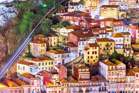 Porto, Portugal overlooking buildings in the Ribeira area at night.の写真素材