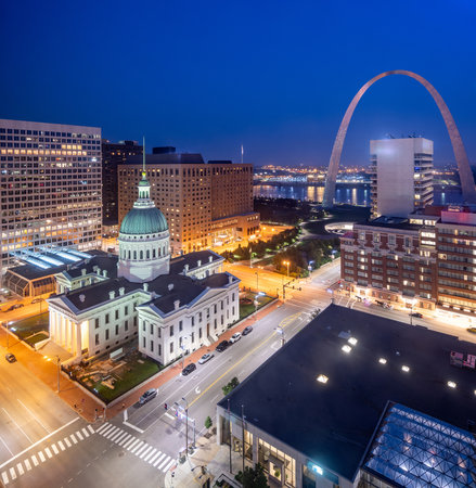 St. Louis, Missouri, USA downtown cityscape with the arch and courthouse at night.の写真素材