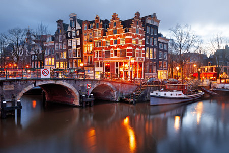 Amsterdam, Netherlands bridges and canals at twilight.の写真素材